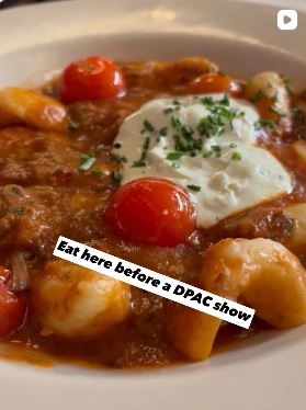 Gnocchi dish with text reading "eat here before a dpac show."